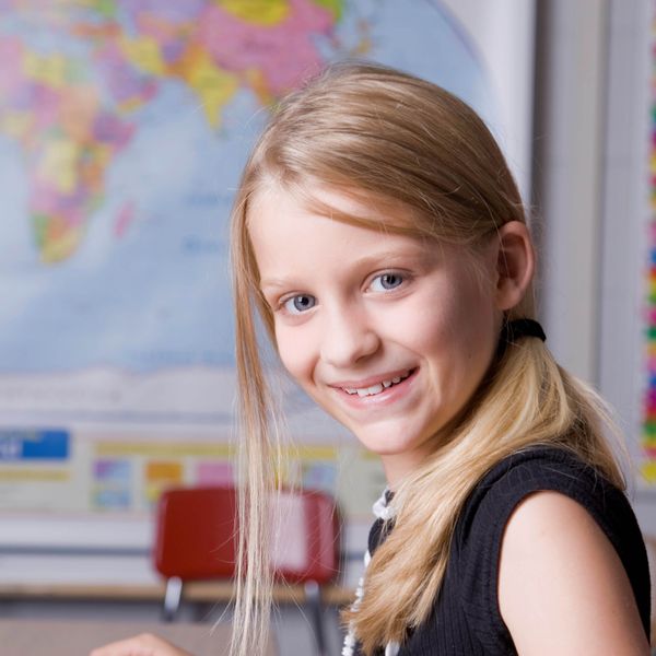 girl in front of map