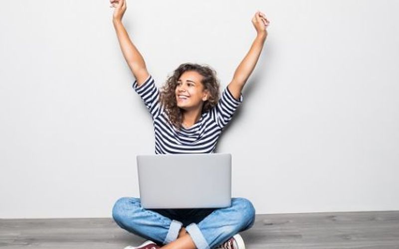 woman with raised hands